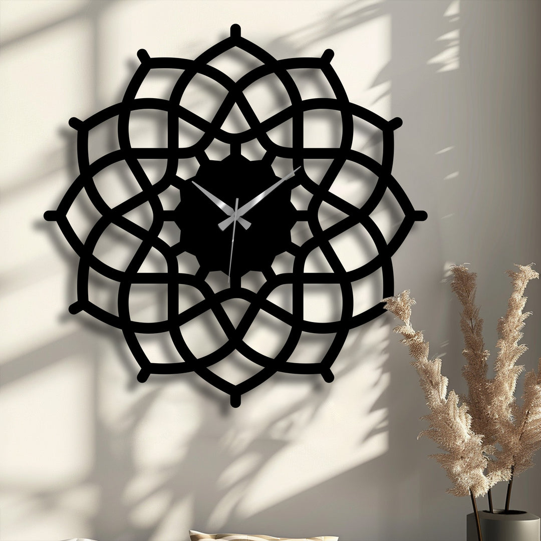 The stillness of a geometric mandala metal wall clock is emphasized by its symmetrical design, showcasing decorative metal art as the hands mark time.