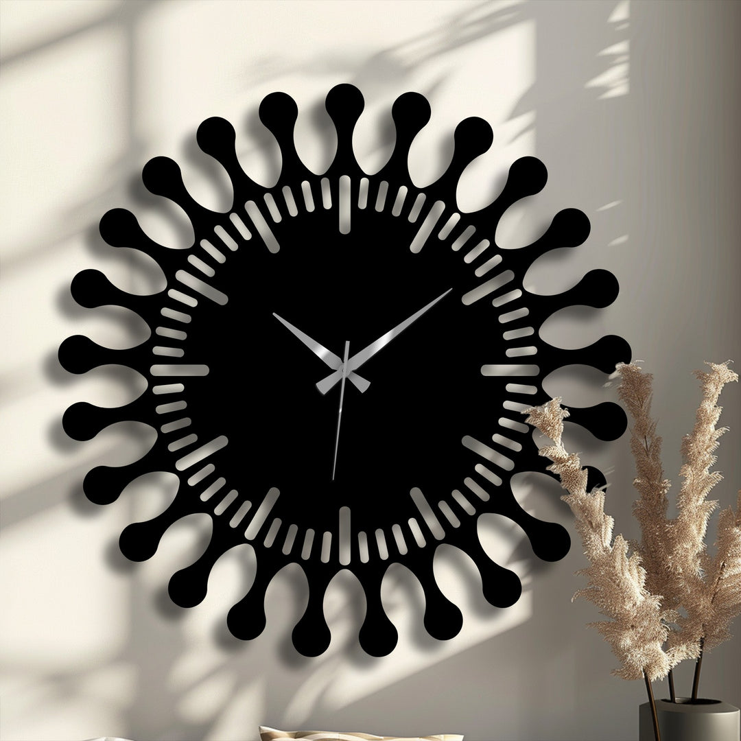 Featuring a bold, sunburst design, this modern metal wall decor clock makes a striking statement as the loudest element in the room.