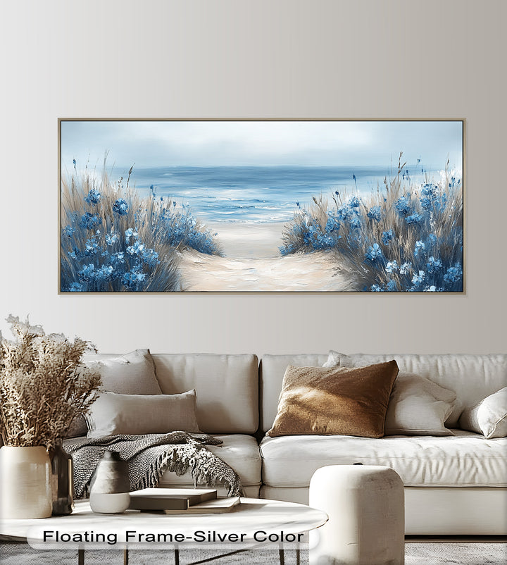 The gentle flow of the dunes and waves invites the viewer into a tranquil seaside escape, perfect for quiet contemplation.