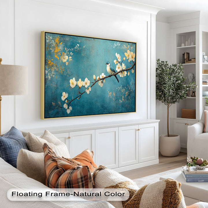 A serene image of nature with a blue and white bird among creamy blooms, set on a soft turquoise and gold backdrop.