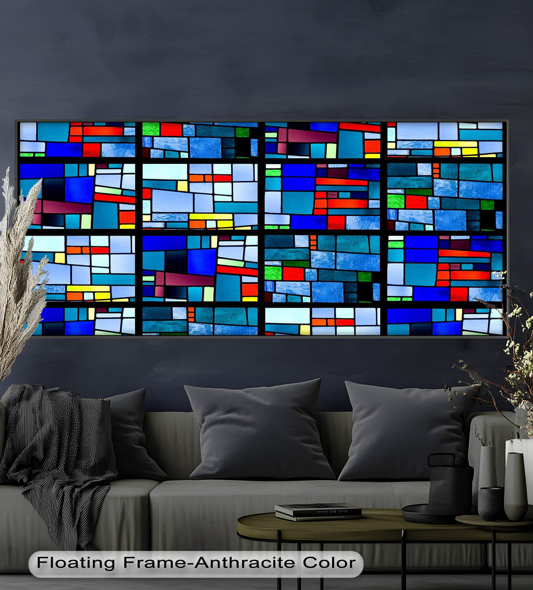 A stunning stained design featuring a mosaic of rectangles in vivid blues, reds, yellows, and purples.

