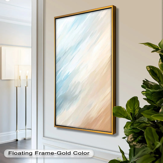 Foreground foliage partially obscures a calming seaside drift modern oil painting art featuring soft blue and sand hues in a golden floating frame.