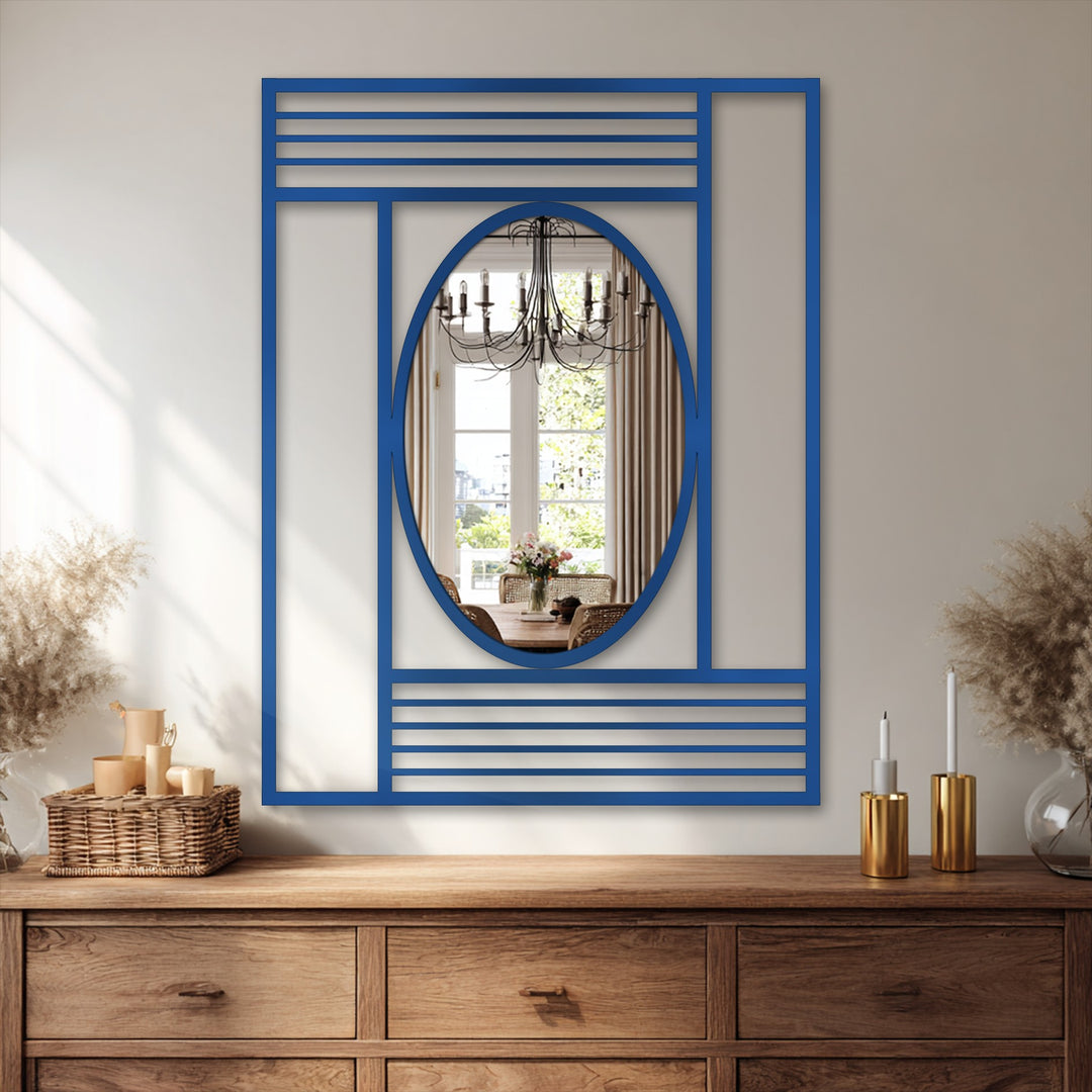 The cobalt bathroom mirror features a distinct geometric frame with structured lines forming the edge, offering a modern, balanced, oval reflection.