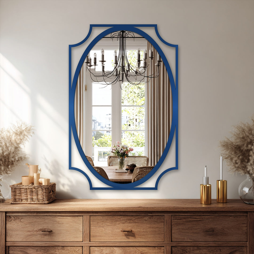 Light and shadow play across the wall behind this navy-framed minimalist oval floor mirror, enhancing the reflective surface while decorating with wall mirrors.