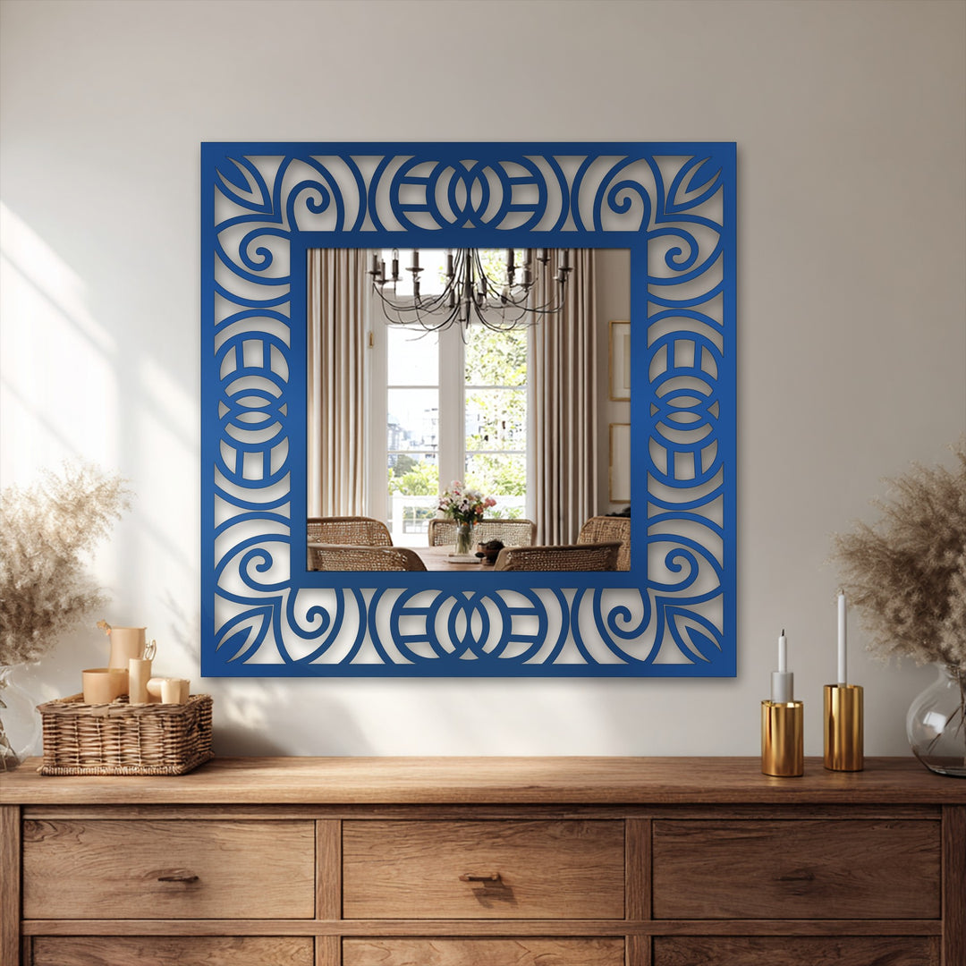 The ornamental scroll pattern of the framed wall mirror contrasts with the brightest areas in the reflected room scene, creating an intriguing decoration wall art piece.