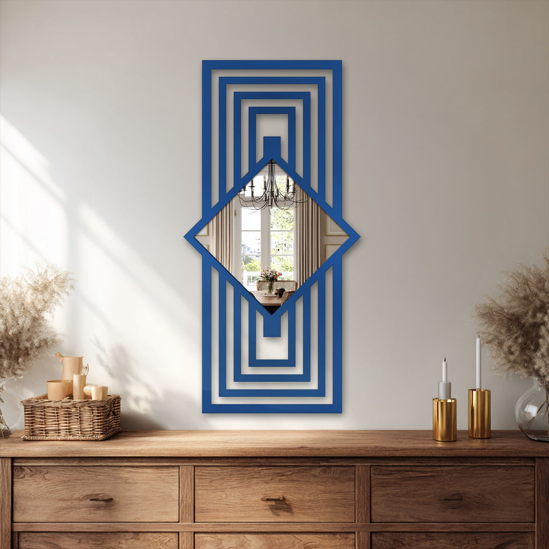 Showcasing depth and layers, this art deco mirror features a diamond inset creating the illusion of a receding frame, perfectly embodying decorating with wall mirrors.