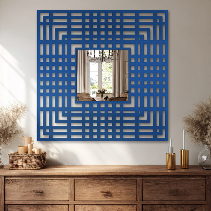 Bold blue color contrast highlights the modern linear design of the geometric grid pattern frame in this stained glass wall mirror.