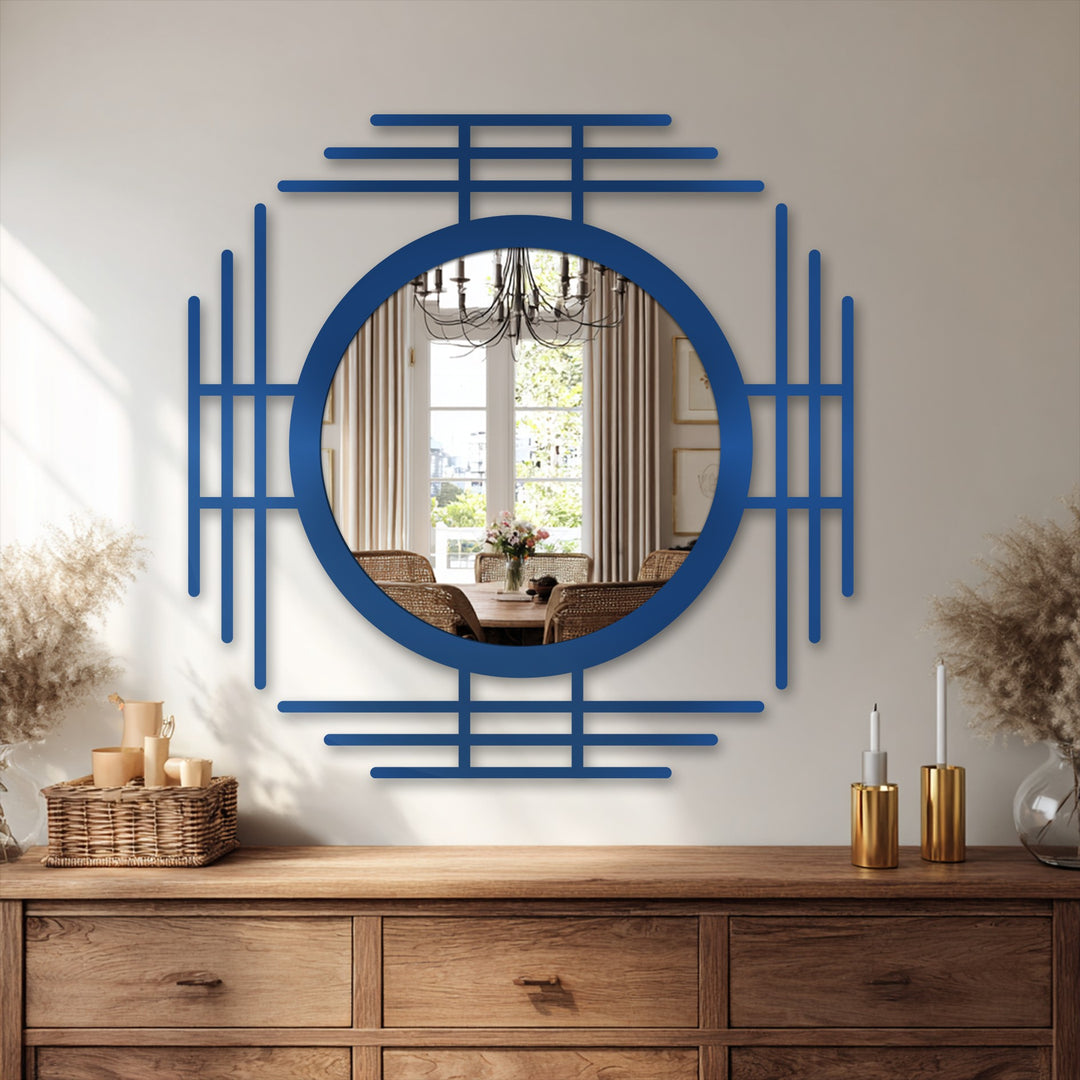 Smooth surface texture of the azure decorative mirror contrasts with geometric metal lines in this modern circle design, reflecting a softly lit dining room.