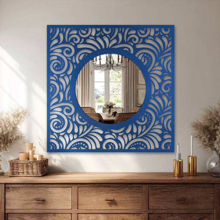 Reflecting the brightest area, this decorative mirror features an ornate blue-patterned frame, providing a stylish way of decorating with wall mirrors and adding a touch of artistry to your home.