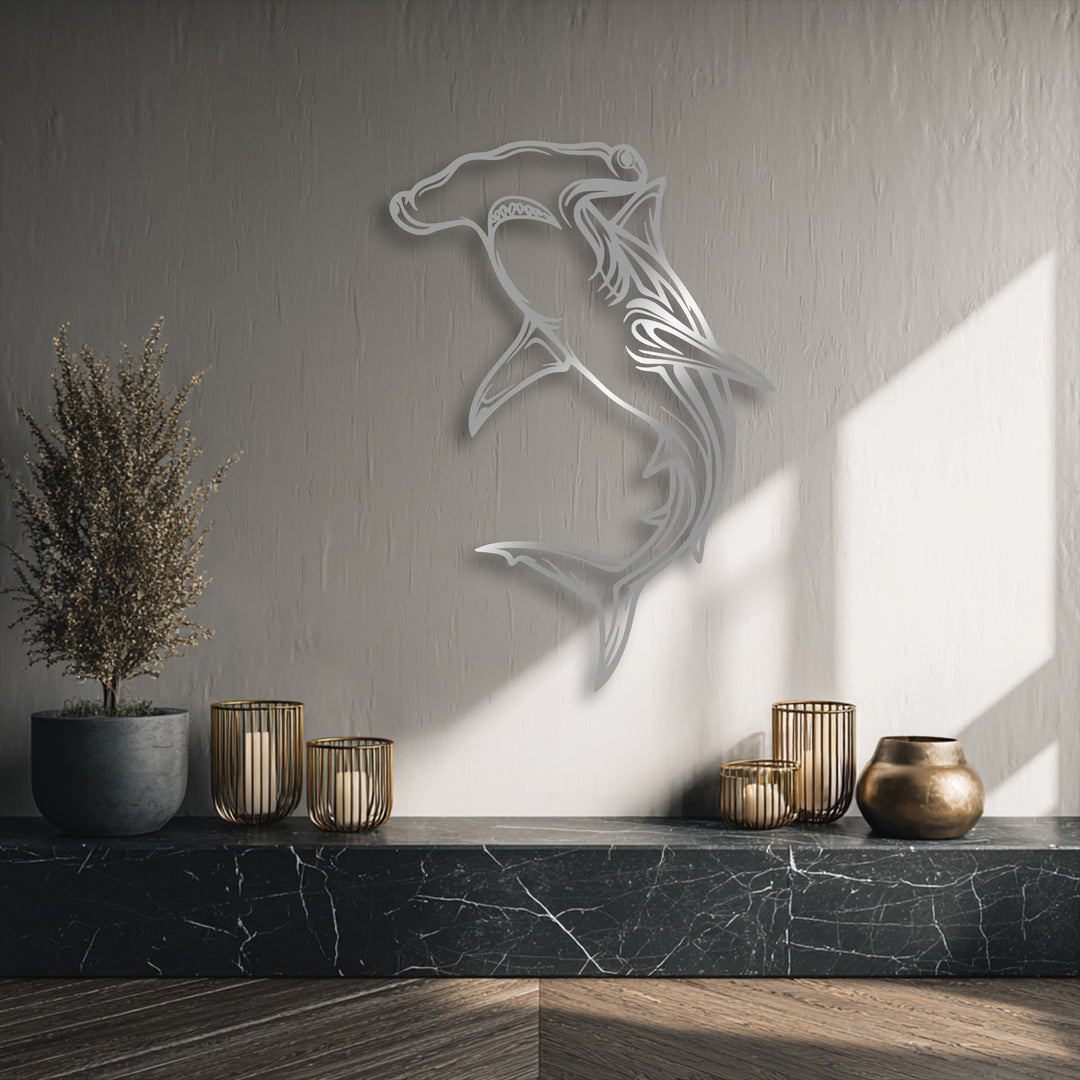 An abstractly designed Hammerhead Shark metal wall decor with tribal patterns beautifully captures the essence of an ocean predator.