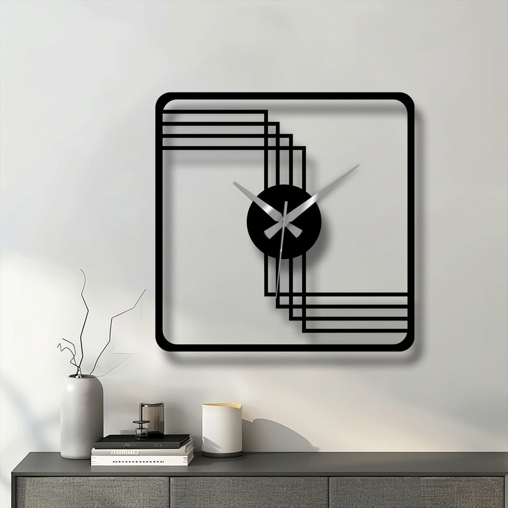 Black is the dominant color of this modern square frame geometric decorative metal art wall clock with a minimalist design.