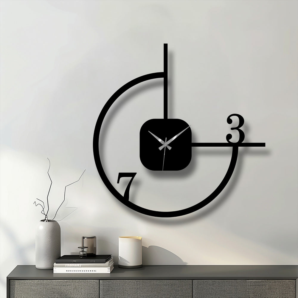 Showing the realistic detail, this minimalist geometric metal wall clock presents a striking metal artwork with its abstract circle design, enhancing any modern decor.
