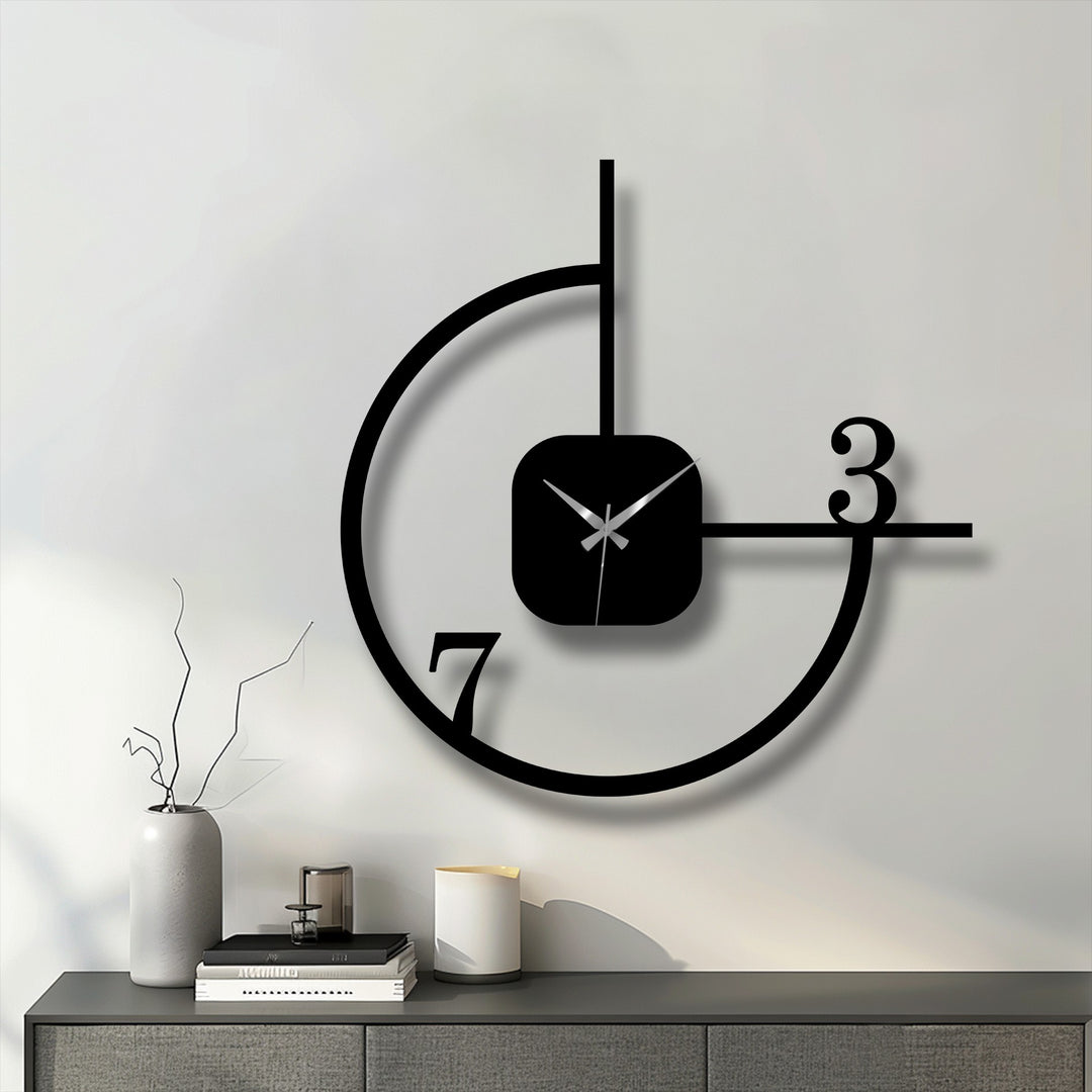 Showing the realistic detail, this minimalist geometric metal wall clock presents a striking metal artwork with its abstract circle design, enhancing any modern decor.