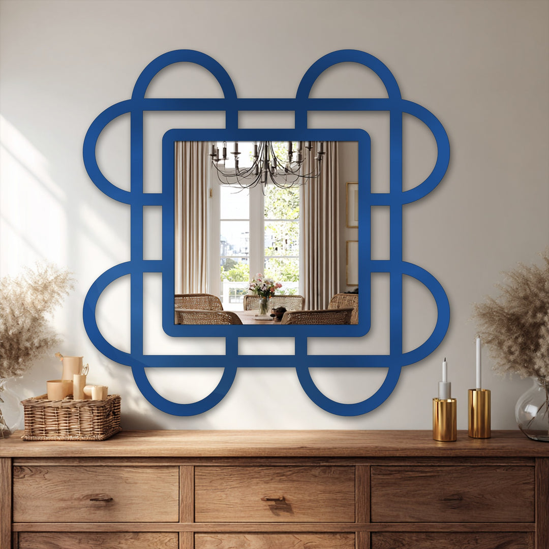 Serene decorating with wall mirrors creates a calming reflection in the Looped Squares geometric design, lending modern flair to a traditionally styled room.