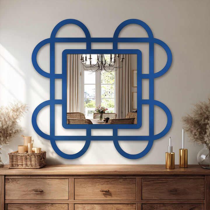 Serene decorating with wall mirrors creates a calming reflection in the Looped Squares geometric design, lending modern flair to a traditionally styled room.