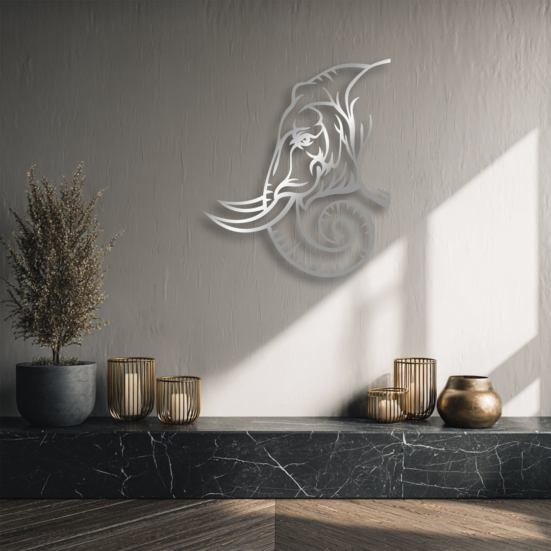 The crisp, clean edges and borders of the silver majestic elephant line art metal decoration wall art stand out against the textured grey wall.
