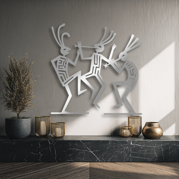 The crisp edges and defined borders of the silver tribal dance figures showcase this beautiful metal art for wall, creating cultural rhythm decor.