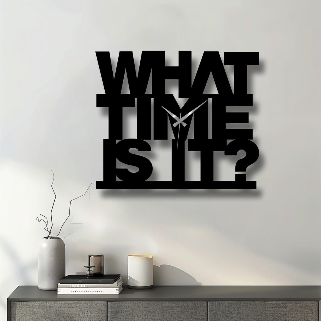 The striking, all-caps 'What Time Is It?' decoration wall art serves as the loudest element in this bold and modern metal wall clock design.