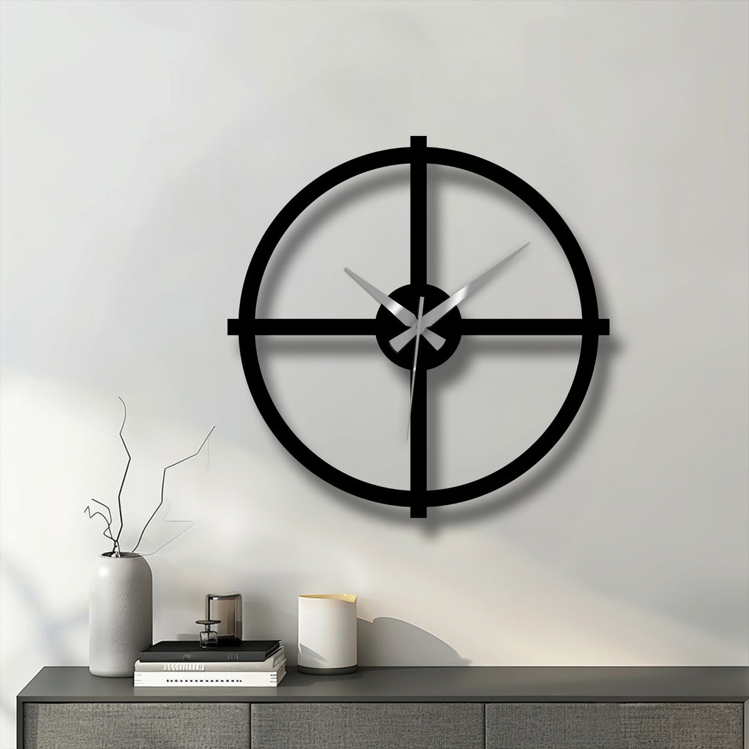 Showcasing the smooth, matte finish of the black metal in this minimalist cross design, making it a unique metal wall art clock perfect for modern decorating.