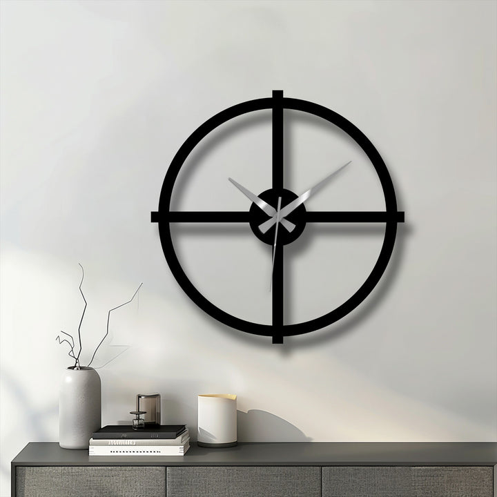 Showcasing the smooth, matte finish of the black metal in this minimalist cross design, making it a unique metal wall art clock perfect for modern decorating.