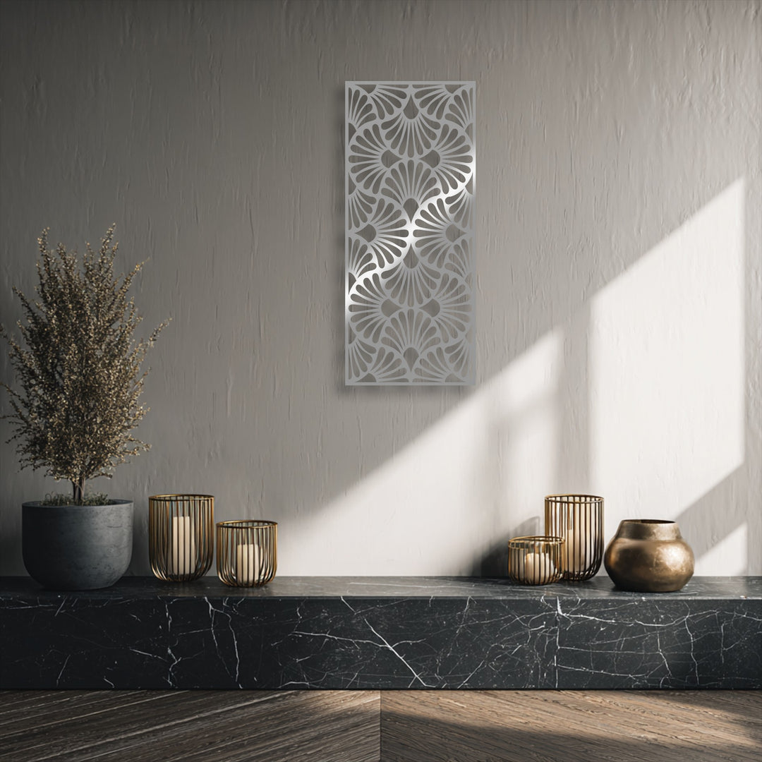 Against a subtle greige wall, the ornate fan pattern of the unique metal wall art stands out with its geometric elegance.