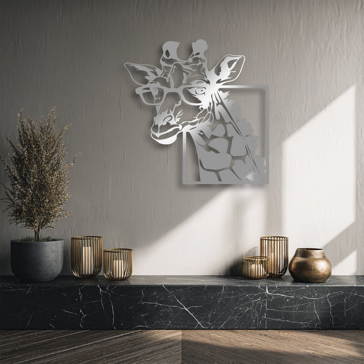 The textured light gray background wall, bathed in strong diagonal sunlight, elegantly complements the stylish giraffe with glasses metal wall decor.