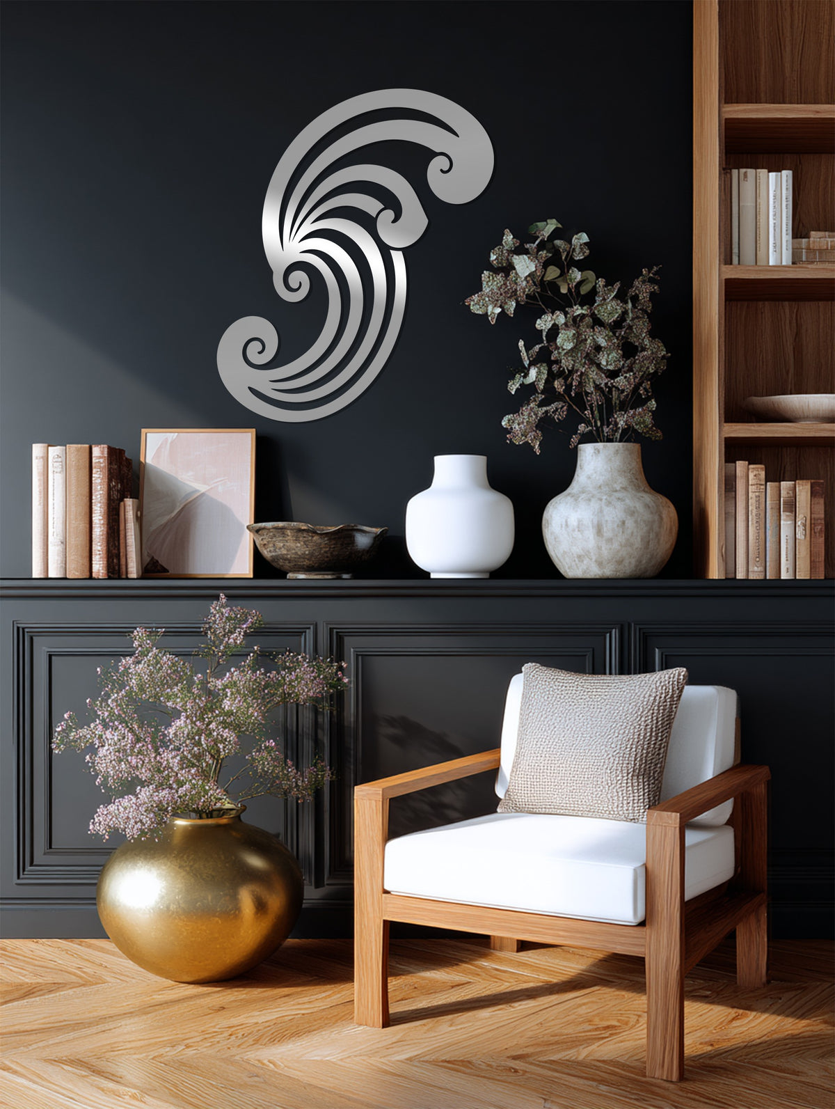 Silver finish accentuates the swirl spiral design of this striking metal art for wall, creating a modern abstract sculpture.