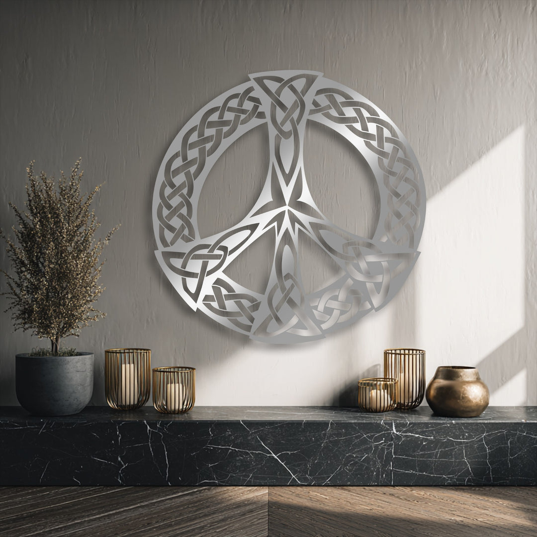 The elegant silver Celtic Knot Peace Symbol Metal Wall Art serves as a stunning piece of decoration wall art on a textured wall.