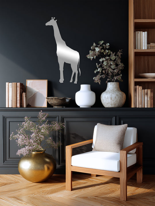 Negative space outlines the giraffe in this decorative metal art piece, creating a safari wildlife silhouette that enhances the minimalist wall décor.