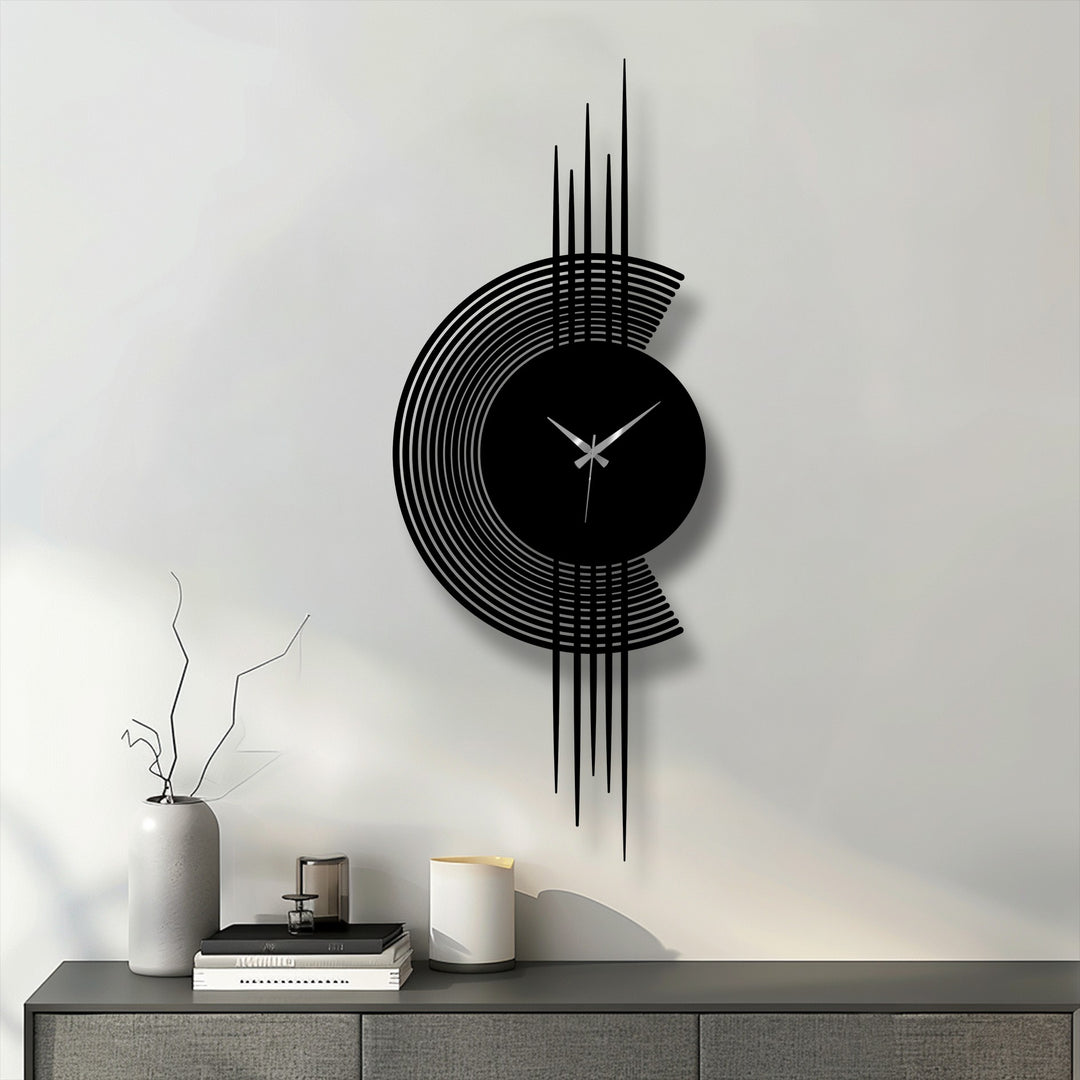 Highlighting the abstract quality, the modern arc line metal wall clock features a minimalist vertical design as striking metal wall decor for contemporary spaces.