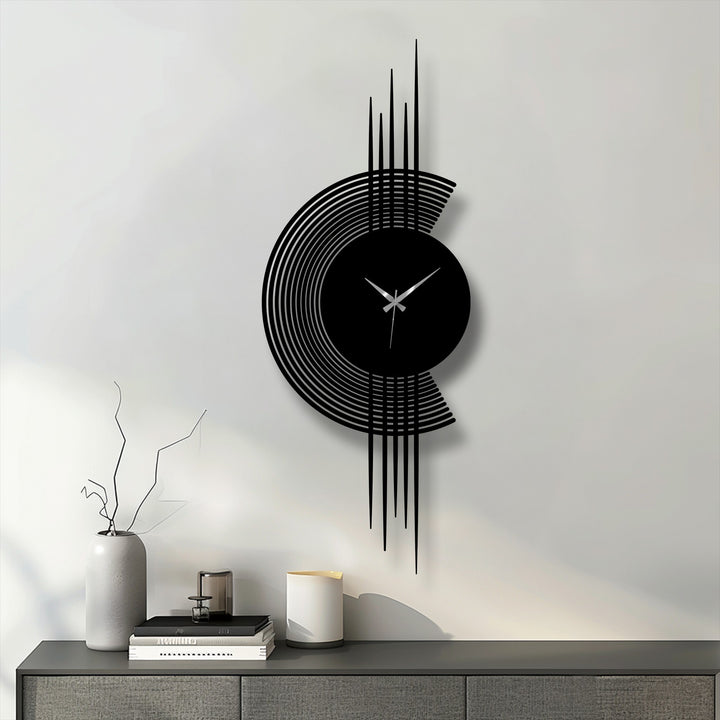 Highlighting the abstract quality, the modern arc line metal wall clock features a minimalist vertical design as striking metal wall decor for contemporary spaces.
