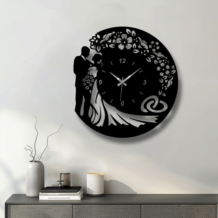 The stillness of a cherished moment is gracefully depicted on this unique metal wall art clock, showcasing a romantic bride and groom love design.