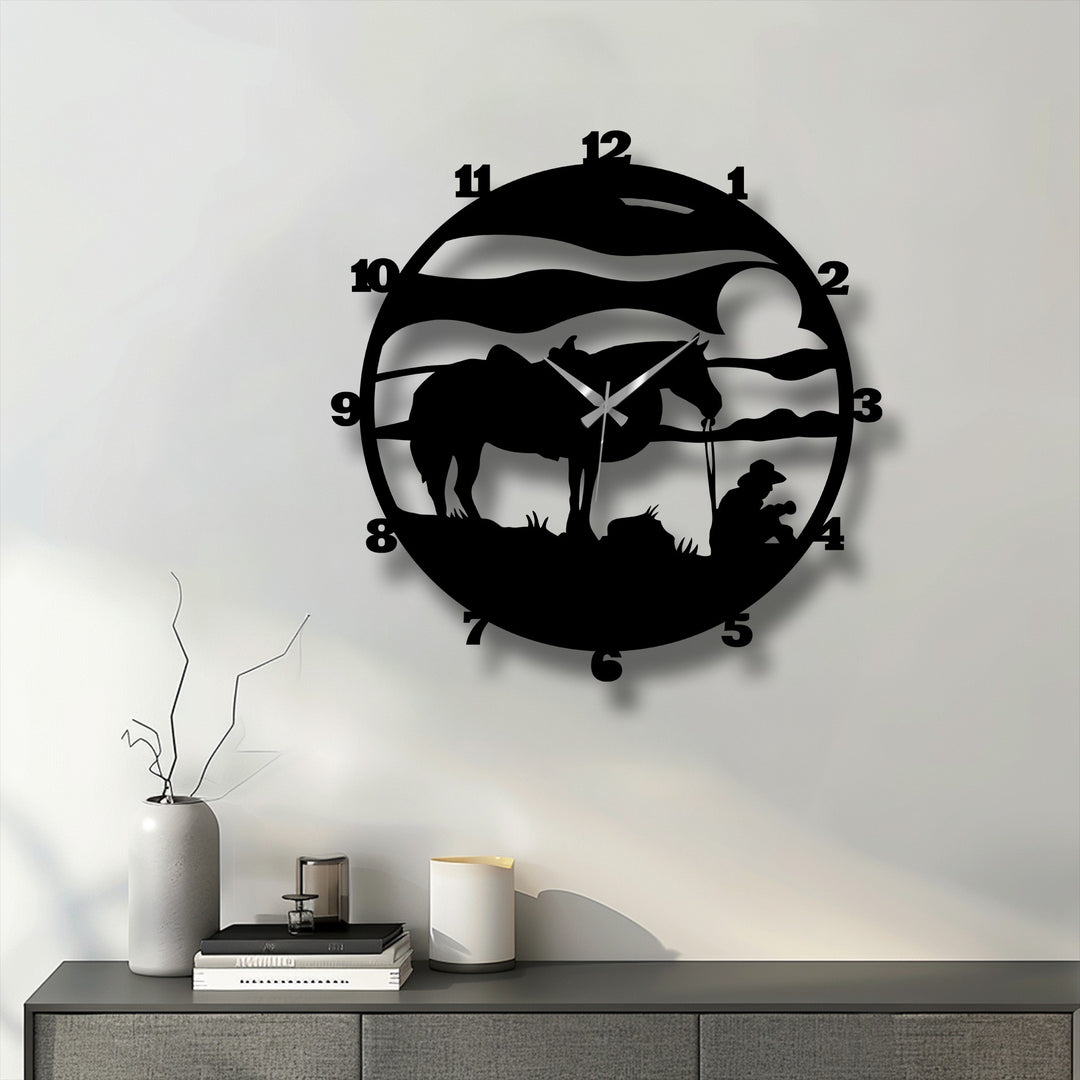Relatively muted color saturation enhances the stark silhouette of the cowboy horse metal wall clock, showcasing its rustic, unique metal wall art ranch design.