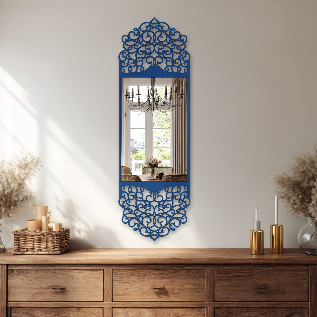 Shadows define the intricate details of this arabesque arch-framed wall mirror, a stunning framed wall mirror with an elegant black metal art for wall design.