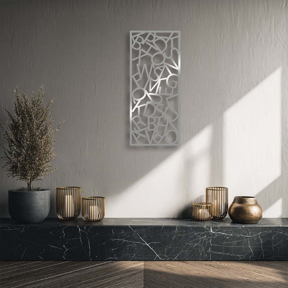 Vertically oriented rectangular metal wall decor features abstract typography chaos with scattered letters, perfect for modern letter composition.