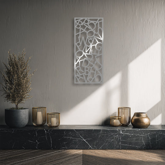 Vertically oriented rectangular metal wall decor features abstract typography chaos with scattered letters, perfect for modern letter composition.