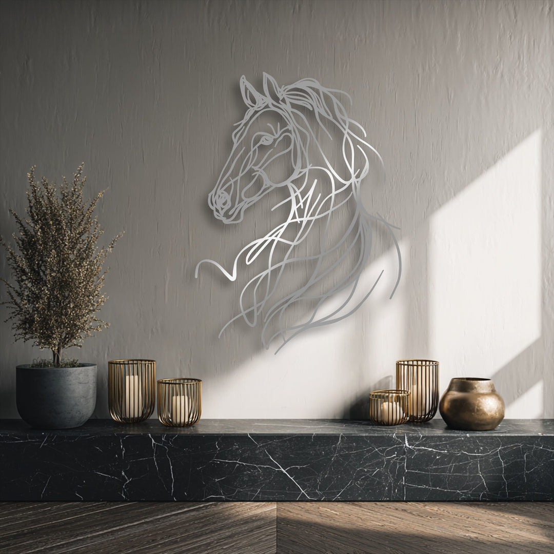 A muted palette of desaturated colors highlights the elegant abstract horse line metal wall decor, complemented by warm brass accents.