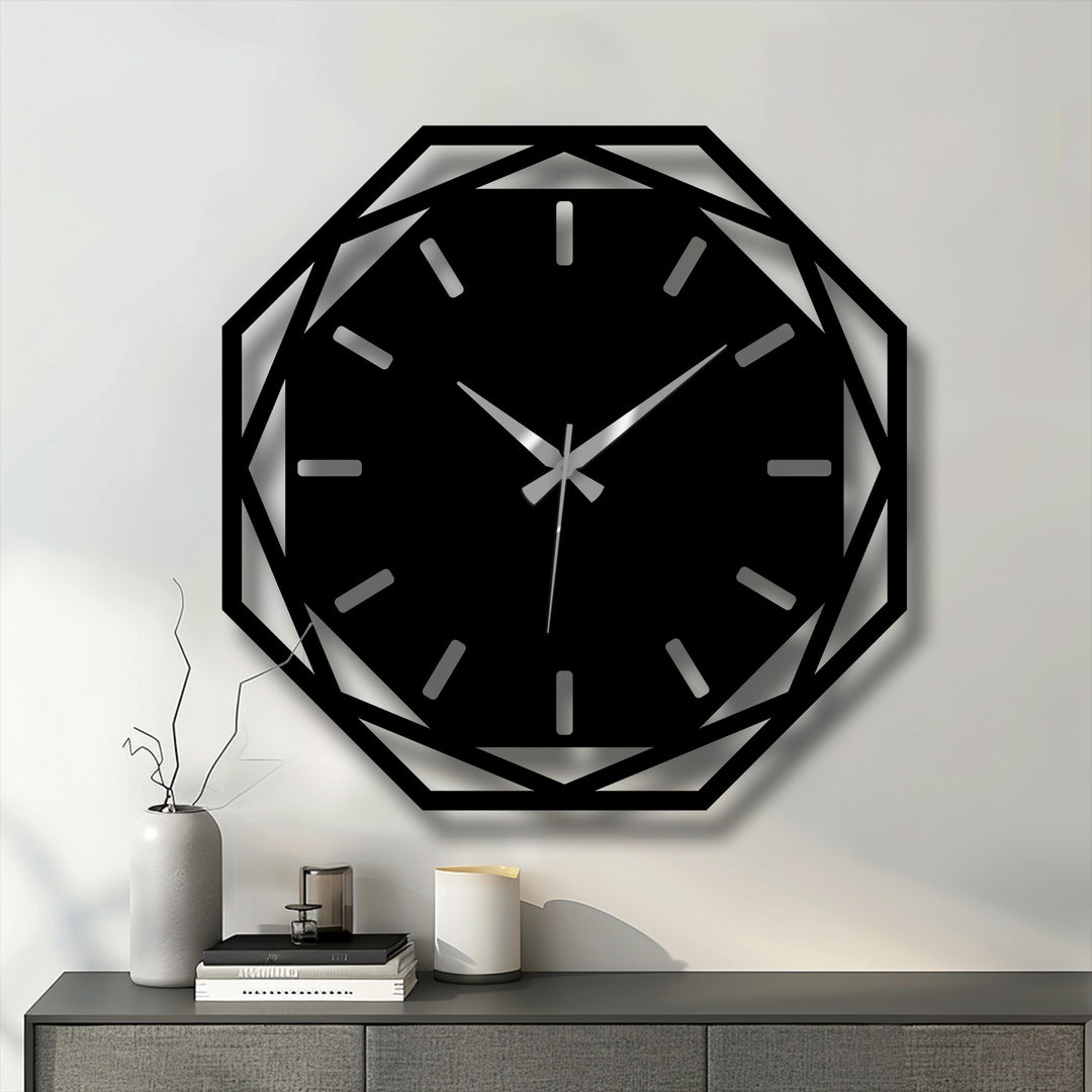 Displayed against a neutral wall, the decorative metal art clock adds geometric flair above a contemporary gray console table complemented by minimalist home decor.