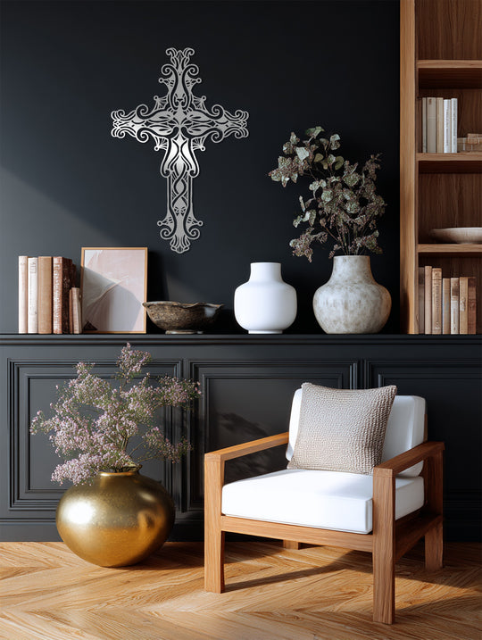 Dark gray ornate metal cross wall art, the dominant color in the decor, presents graceful filigree details as an elegant piece of metal wall decor.