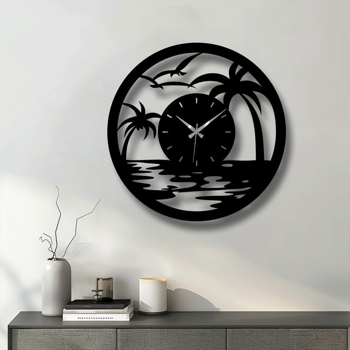 Shadows define the cut-out palm trees and birds in this tropical sunset decorative metal art clock, highlighting the beach scene against the wall.