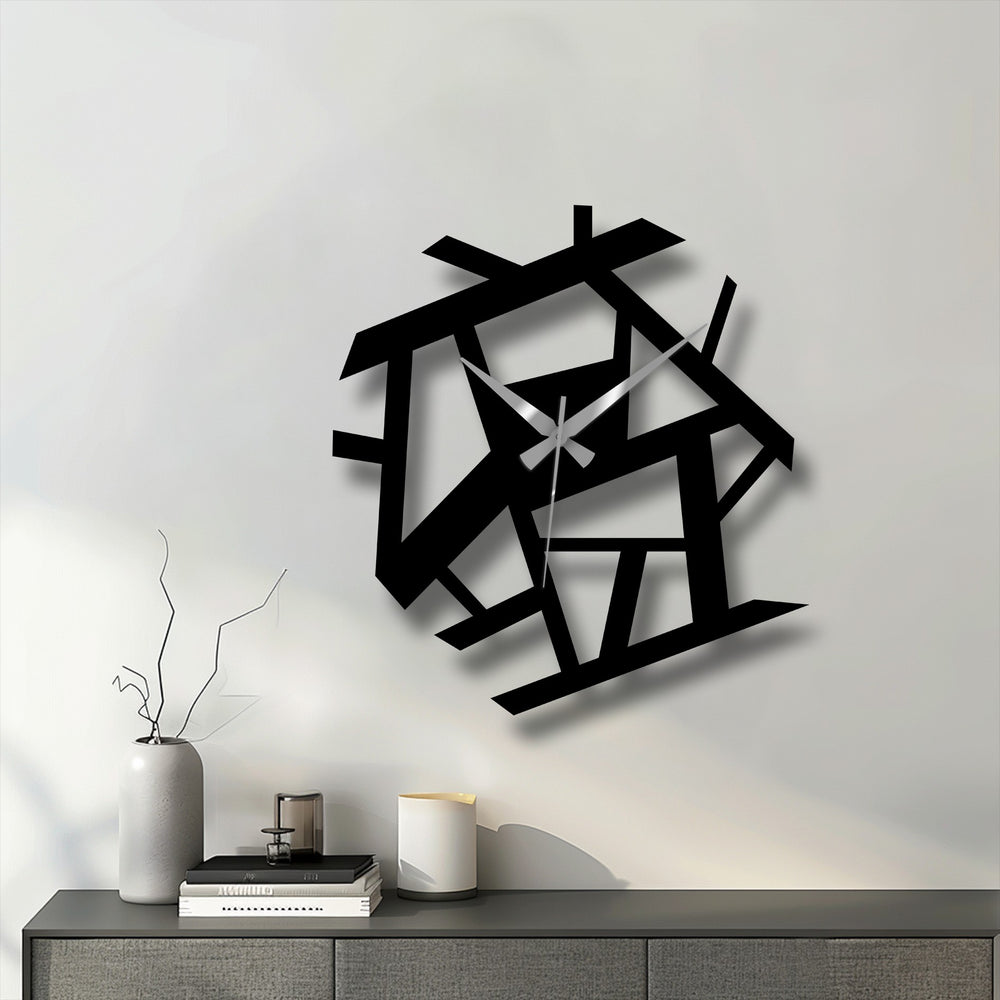 Featuring its geometric elements, the abstract metal wall clock showcases a unique metal wall art design of intersecting lines and shapes.