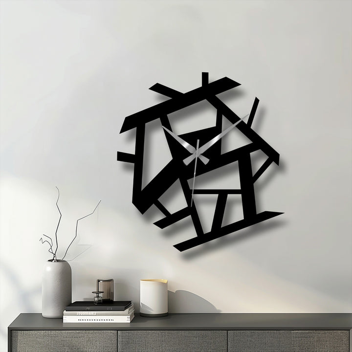 Featuring its geometric elements, the abstract metal wall clock showcases a unique metal wall art design of intersecting lines and shapes.
