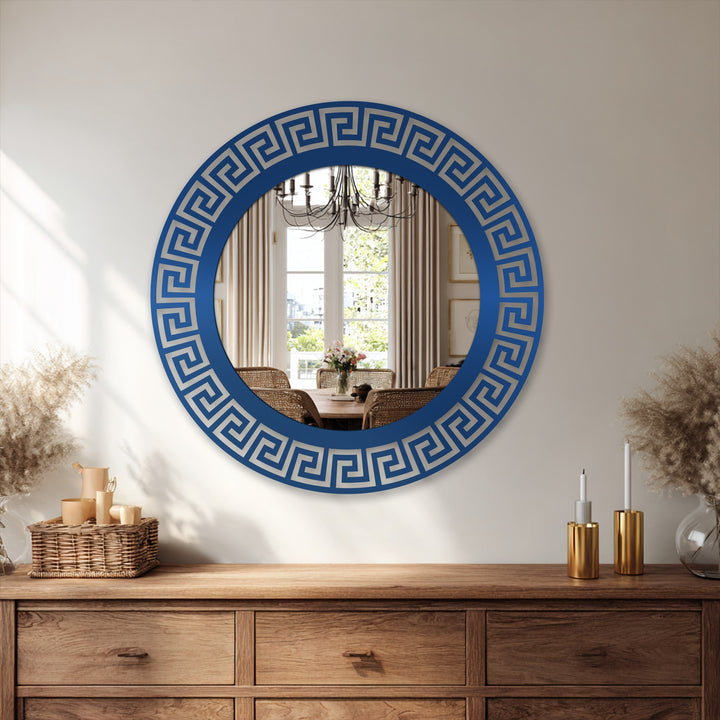 Featuring a striking geometric Greek key pattern, the navy edge on this round statement mirror for wall decor enhances its modern design.