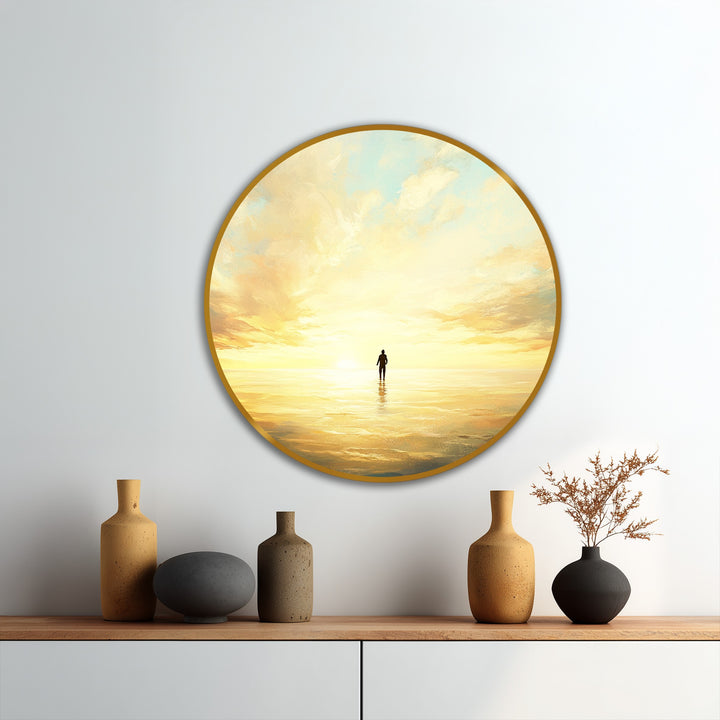 Organic forms accentuate the round oil painting art prints of a figure at sunset, mirroring the fluid shapes of vases displayed below.
