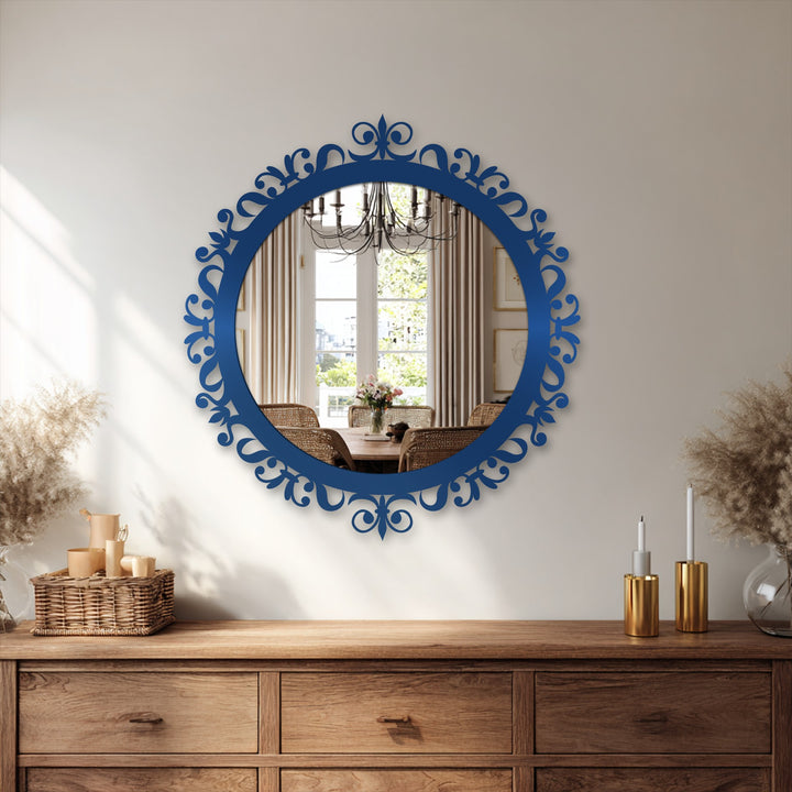 Sweeping flourishes in the baroque frame give this round bathroom mirror a rhythmic sense of movement, enhancing its statement design.
