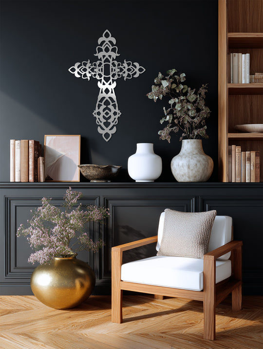 The stillness of the room is captured by the ornamental black cross metal art for wall, creating a decorative accent in a quiet, elegant setting.