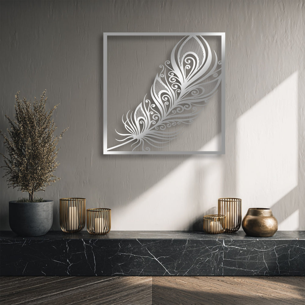 Depth is created by the ornate feather decorative metal art, layered on a textured wall above a richly veined marble shelf with accent pieces.