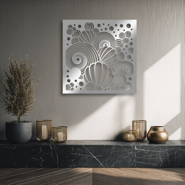 Distinctive organic balloon and spiral forms in this gleaming silver metal art for wall create a contemporary abstract design.