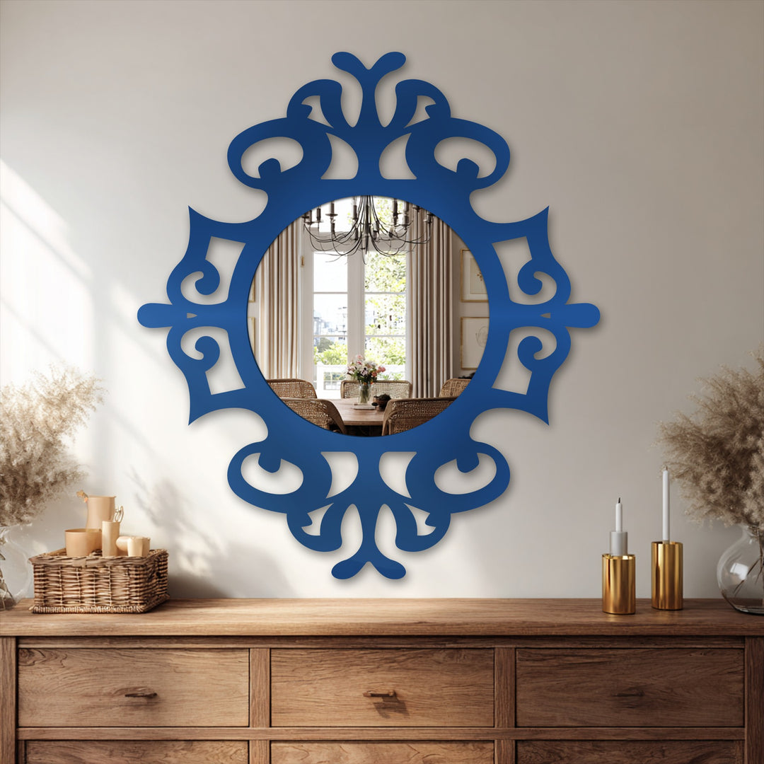 Undulating in a timeless fashion, the ornate round mirror seems to dance, its stained glass wall mirror details capturing the movement of light and reflection.