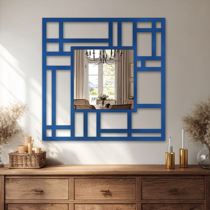 The foreground detail features a wooden dresser displaying a geometric grid structured modern mirror, a unique metal wall decor accenting its handcrafted frame.